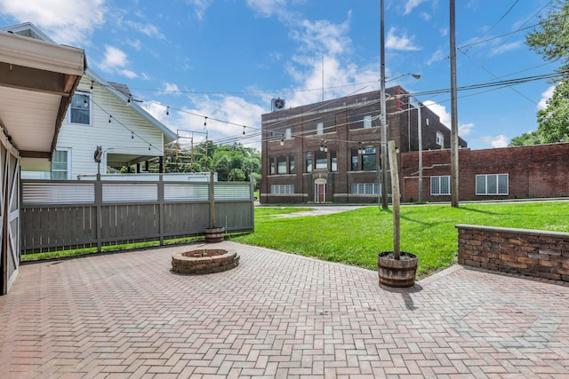 522 S Main St, New Lexington, OH 43764 - view of patio featuring an outdoor fire pit