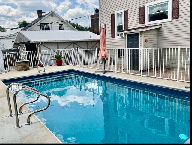 522 S Main St, New Lexington, OH 43764 - view of swimming pool featuring a patio area