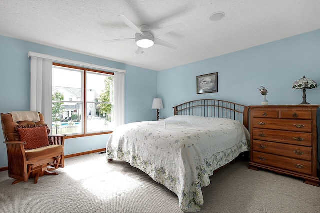 12961 Arabian Ct, Pickerington, OH 43147 - carpeted bedroom with a textured ceiling and ceiling fan