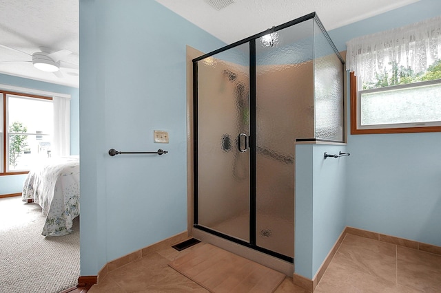 12961 Arabian Ct, Pickerington, OH 43147 - full bath featuring ensuite bathroom, a stall shower, ceiling fan, and tile patterned floors