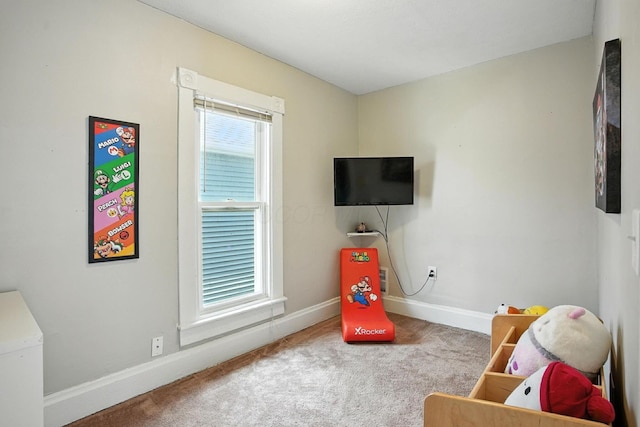 628 Reinhard Ave, Columbus, OH 43206 - rec room with carpet floors and baseboards