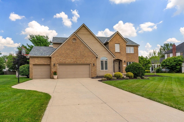 13191 Brandon Cir, Pickerington, OH 43147 - traditional home featuring a front yard, brick siding, a garage, concrete driveway, and roof with shingles