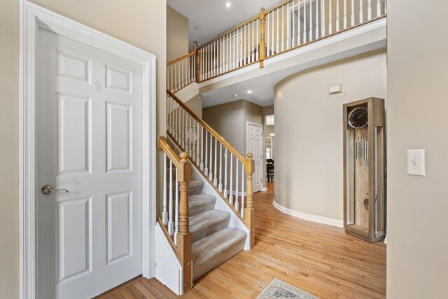13191 Brandon Cir, Pickerington, OH 43147 - stairs featuring wood finished floors and baseboards