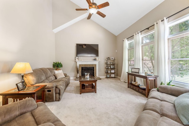 13191 Brandon Cir, Pickerington, OH 43147 - living area featuring ceiling fan, a fireplace, light carpet, and high vaulted ceiling