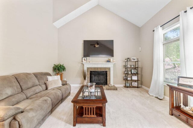 13191 Brandon Cir, Pickerington, OH 43147 - living area featuring light carpet, a brick fireplace, lofted ceiling, and ceiling fan