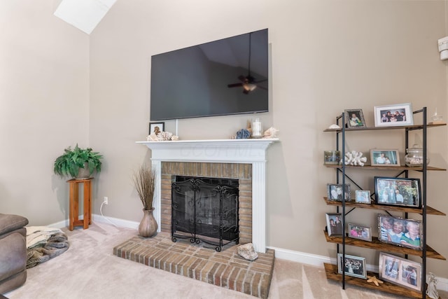 13191 Brandon Cir, Pickerington, OH 43147 - living area featuring carpet, a fireplace, ceiling fan, and vaulted ceiling