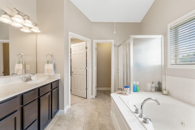 13191 Brandon Cir, Pickerington, OH 43147 - full bath featuring vanity, a whirlpool tub, a stall shower, and tile patterned floors