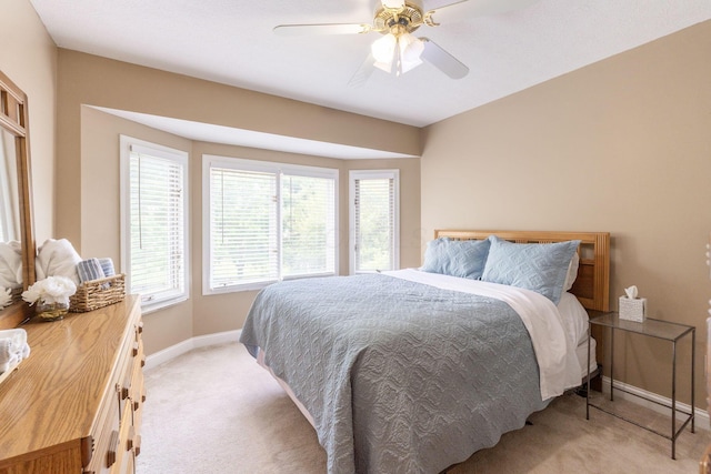 13191 Brandon Cir, Pickerington, OH 43147 - bedroom with light carpet, multiple windows, and ceiling fan