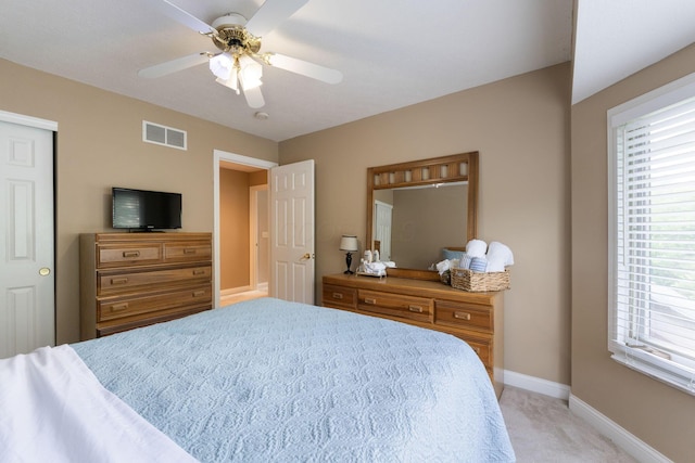 13191 Brandon Cir, Pickerington, OH 43147 - bedroom featuring light colored carpet, multiple windows, and ceiling fan