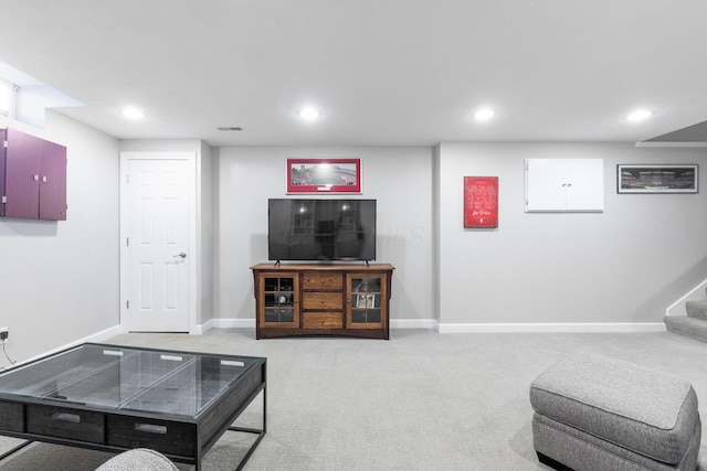 13191 Brandon Cir, Pickerington, OH 43147 - living room with recessed lighting, stairs, and light colored carpet