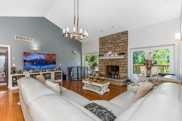 1800 Lynnbrook Ct, Orient, OH 43146 - living area with high vaulted ceiling, a chandelier, hardwood / wood-style floors, and a fireplace