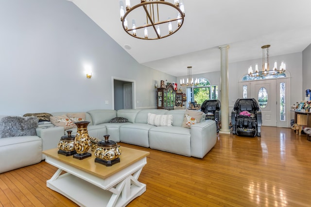 1800 Lynnbrook Ct, Orient, OH 43146 - living room with a chandelier, high vaulted ceiling, and light wood-type flooring