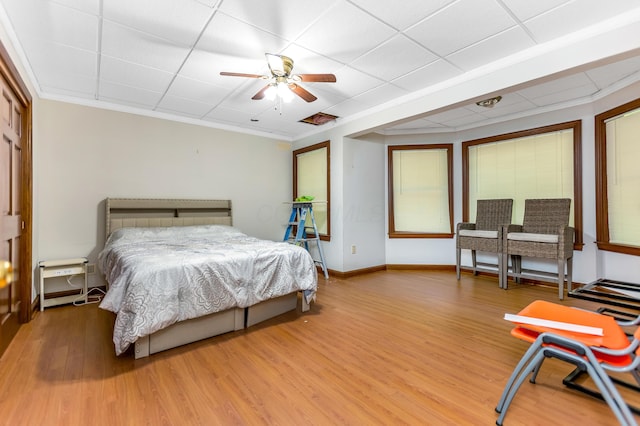 1800 Lynnbrook Ct, Orient, OH 43146 - bedroom with wood finished floors, a drop ceiling, and a ceiling fan
