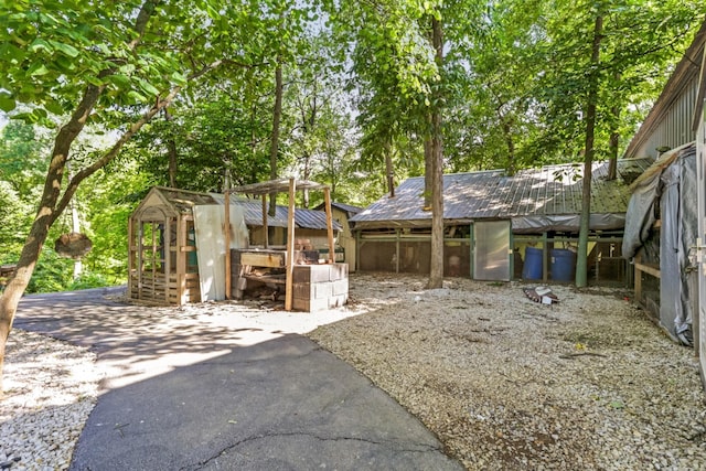 1800 Lynnbrook Ct, Orient, OH 43146 - view of patio with an outbuilding and exterior structure