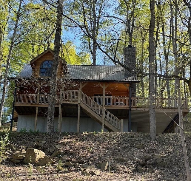 1607 Kato Ln, Sugar Grove, OH 43155 - back of house featuring stairway, a chimney, and a metal roof
