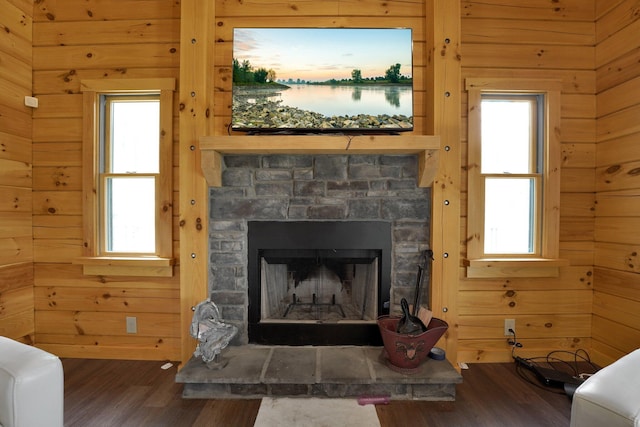 1607 Kato Ln, Sugar Grove, OH 43155 - living room with wood finished floors, a stone fireplace, and wood walls
