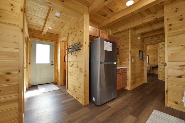 1607 Kato Ln, Sugar Grove, OH 43155 - kitchen featuring freestanding refrigerator, a wooden ceiling with exposed beams, wood walls, dark wood-style floors, and light countertops