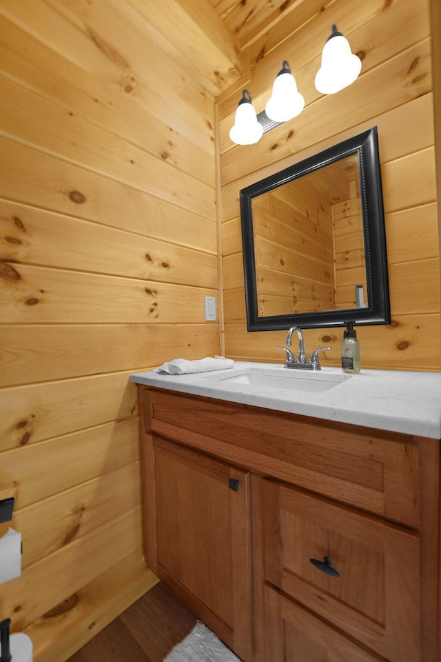 1607 Kato Ln, Sugar Grove, OH 43155 - bathroom with vanity, wood walls, and wood finished floors