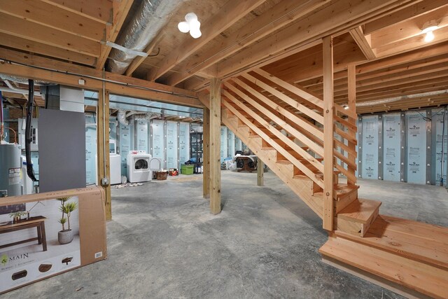 1607 Kato Ln, Sugar Grove, OH 43155 - unfinished basement with washing machine and dryer, stairway, and electric water heater