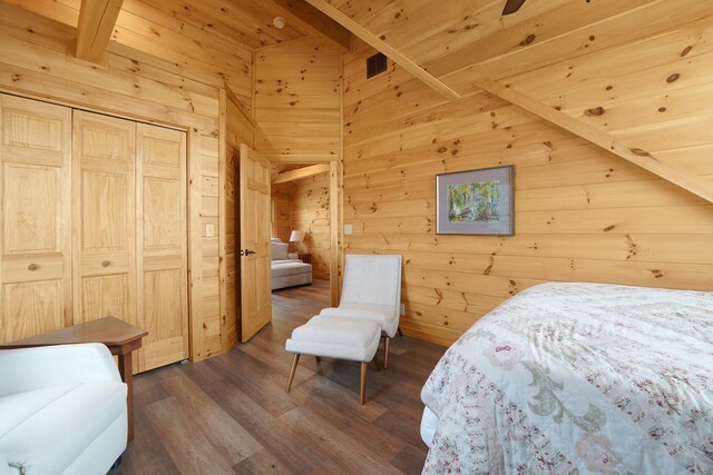 1607 Kato Ln, Sugar Grove, OH 43155 - bedroom featuring wood walls, dark wood-style flooring, wooden ceiling, and a closet