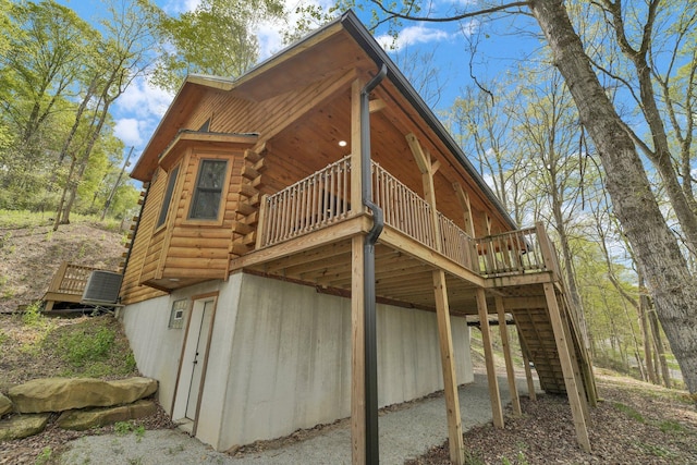 1607 Kato Ln, Sugar Grove, OH 43155 - view of side of home with a deck, log exterior, and stairs