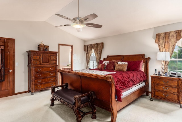 5630 Dorshire Dr, Galena, OH 43021 - bedroom with light carpet, lofted ceiling, multiple windows, a ceiling fan, and ensuite bath