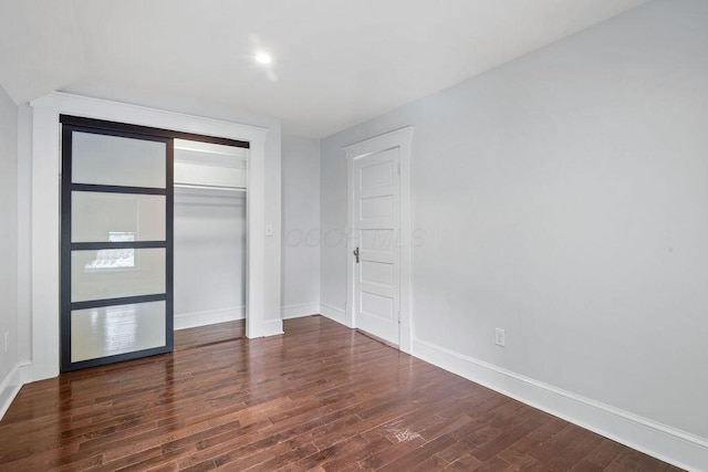 1382 S 5th St, Columbus, OH 43207 - unfurnished bedroom with wood finished floors and a closet