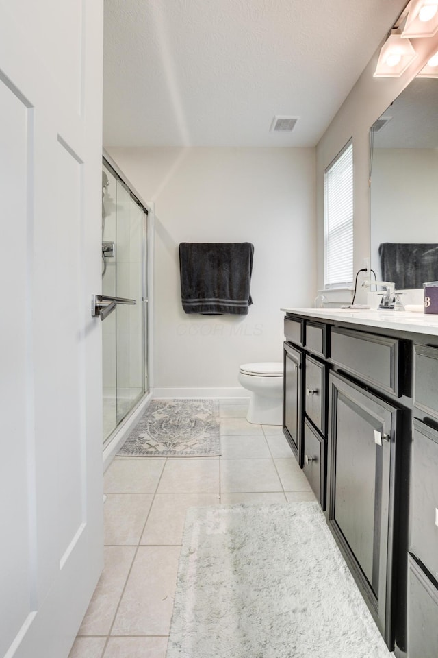 225 Messenger Way, Lewis Center, OH 43035 - bathroom featuring vanity, a shower stall, and tile patterned floors