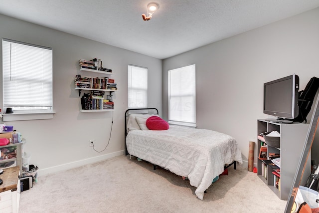 225 Messenger Way, Lewis Center, OH 43035 - carpeted bedroom with baseboards and a textured ceiling