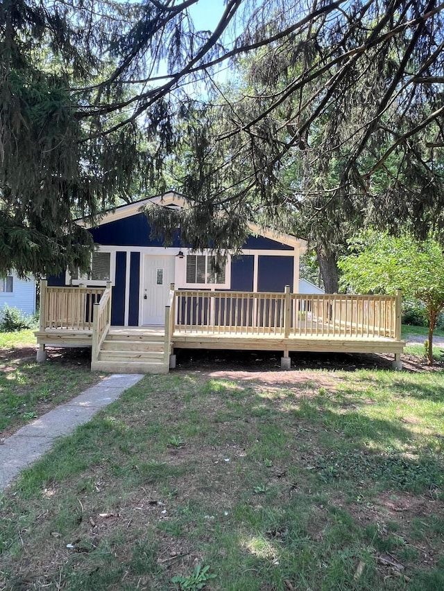 2091 Radnor Ave, Columbus, OH 43224 - back of property featuring a wooden deck and a yard