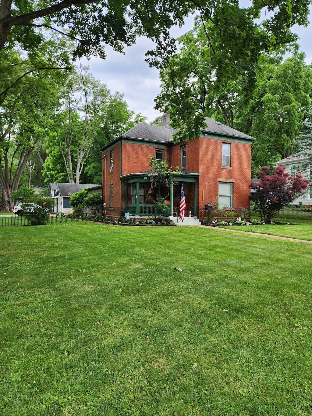 1183 N Columbus St, Lancaster, OH 43130 - back of property with brick siding and a chimney