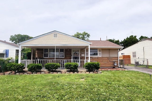 164 E Alcott Rd, Columbus, OH 43207 - view of front of house with a gate and covered porch