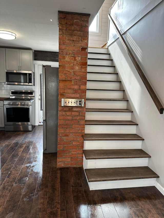 705 Maple Ave, Newark, OH 43055 - staircase featuring wood-type flooring