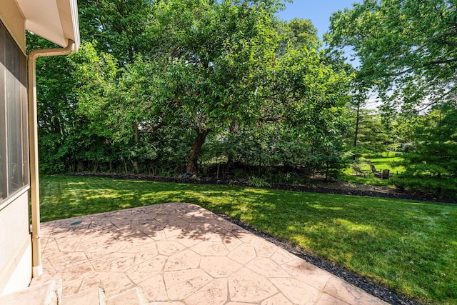 7672 Tullymore Dr, Dublin, OH 43016 - view of patio / terrace featuring view of wooded area