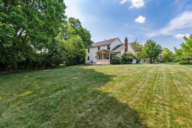 7672 Tullymore Dr, Dublin, OH 43016 - view of green lawn featuring a sunroom