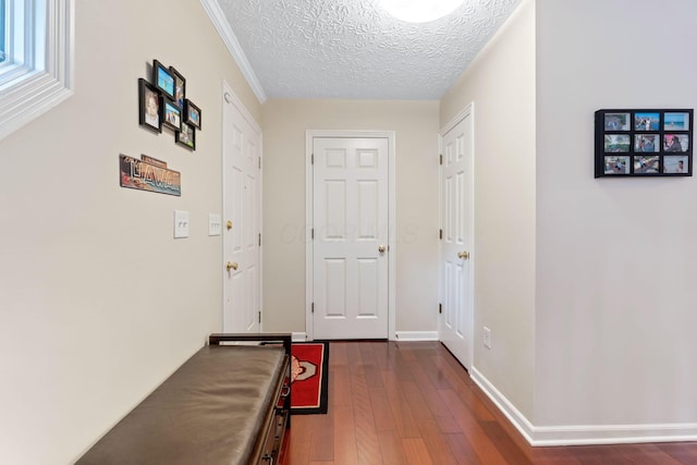 7672 Tullymore Dr, Dublin, OH 43016 - hallway with dark wood-type flooring and a textured ceiling