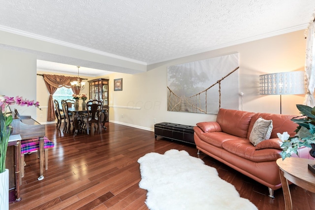 7672 Tullymore Dr, Dublin, OH 43016 - living room featuring a chandelier, wood finished floors, a textured ceiling, and crown molding
