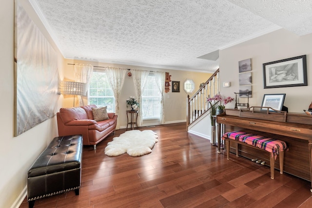 7672 Tullymore Dr, Dublin, OH 43016 - living area featuring a textured ceiling, crown molding, wood finished floors, and stairway