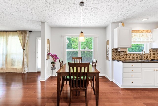 7672 Tullymore Dr, Dublin, OH 43016 - dining space with dark wood finished floors and a textured ceiling