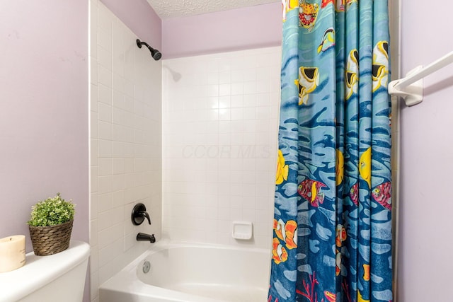 7672 Tullymore Dr, Dublin, OH 43016 - full bath featuring shower / bath combo with shower curtain and a textured ceiling