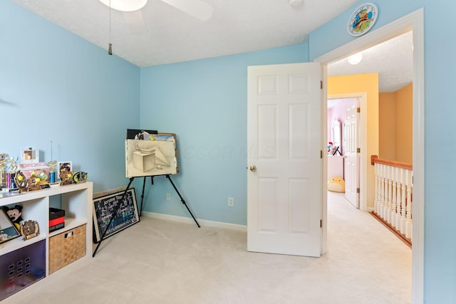 7672 Tullymore Dr, Dublin, OH 43016 - bedroom featuring carpet floors, a textured ceiling, and a ceiling fan