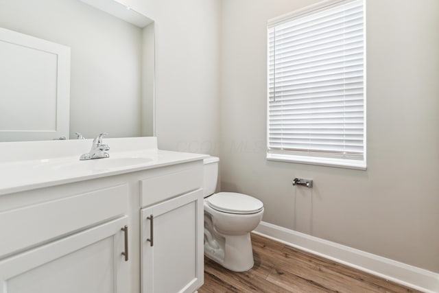 273 S Grubb St S Unit 273, Columbus, OH 43222 - half bathroom with wood finished floors and vanity