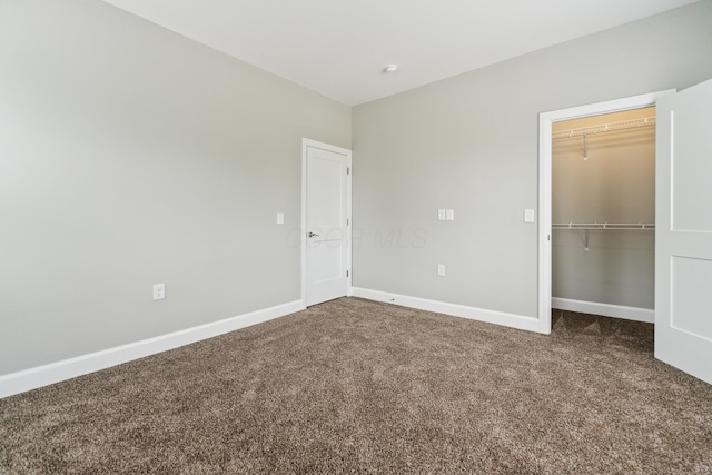 273 S Grubb St S Unit 273, Columbus, OH 43222 - unfurnished bedroom featuring carpet floors and a closet