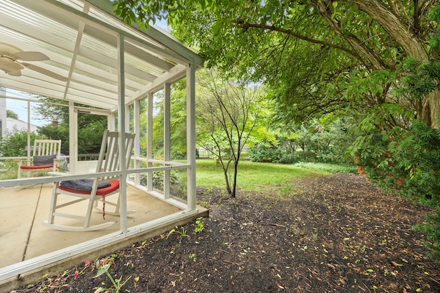 2681 Montcalm Rd, Columbus, OH 43221 - view of yard featuring a sunroom and a ceiling fan