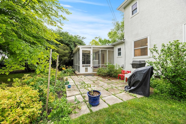 2681 Montcalm Rd, Columbus, OH 43221 - view of yard featuring a sunroom and a patio