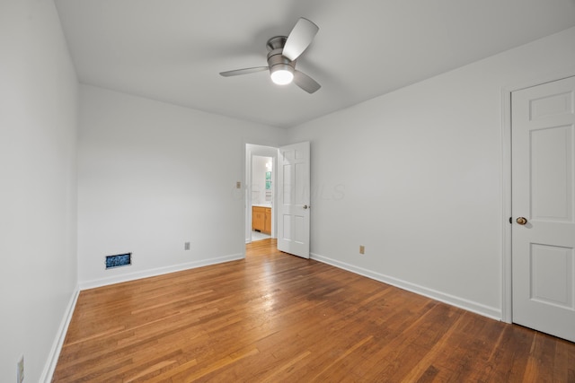 2681 Montcalm Rd, Columbus, OH 43221 - unfurnished bedroom with wood finished floors and a ceiling fan