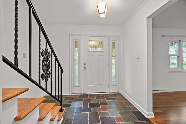 2681 Montcalm Rd, Columbus, OH 43221 - entrance foyer featuring stairway, ornamental molding, and stone finish flooring