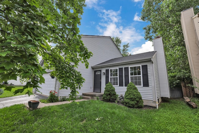 3490 Blendon Bend Way, Columbus, OH 43231 - view of front facade with an attached garage, driveway, and a chimney