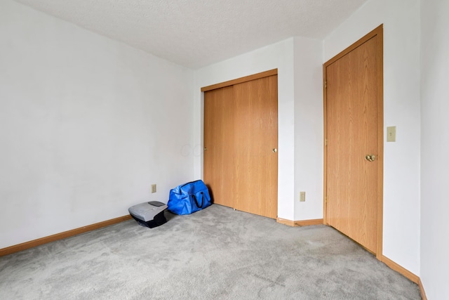 3490 Blendon Bend Way, Columbus, OH 43231 - unfurnished bedroom with carpet, a textured ceiling, and a closet
