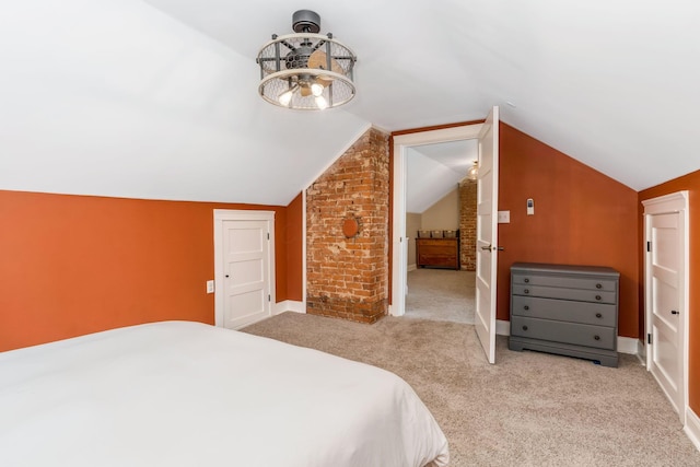 840 N Broad St, Lancaster, OH 43130 - carpeted bedroom featuring lofted ceiling and baseboards